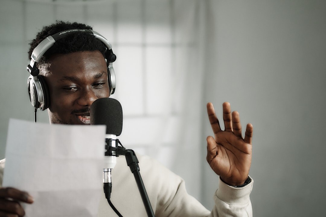 radio journalist speaking into microphone