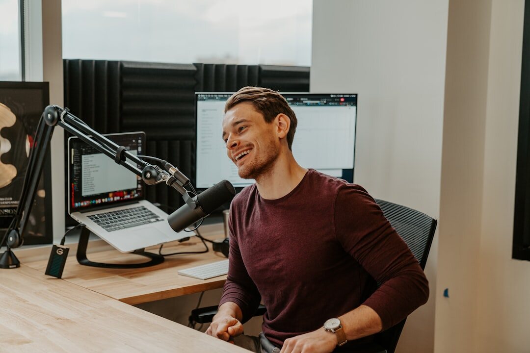 radio host speaking into microphone