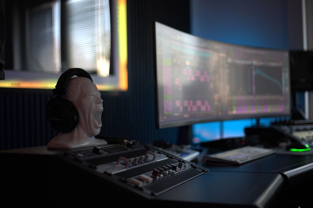 Two people recording a podcast in a modern studio