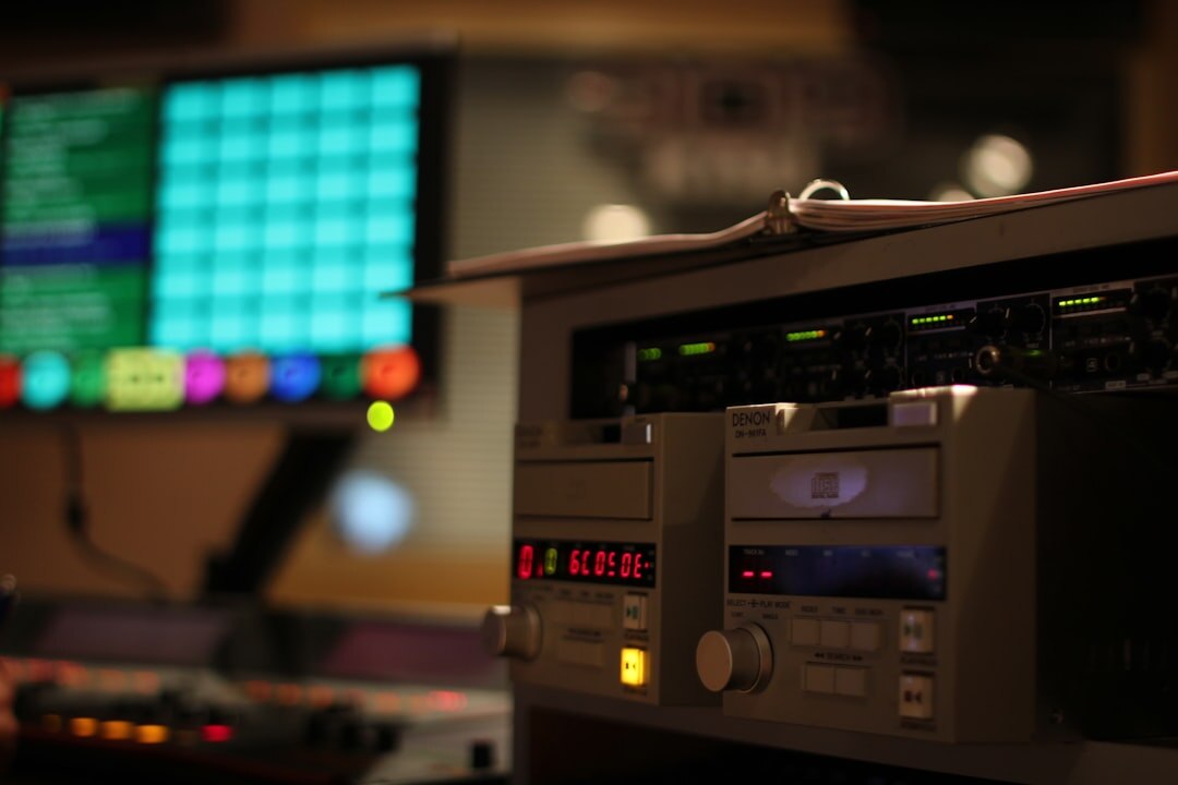 Interior of a professional recording studio with mixing desk