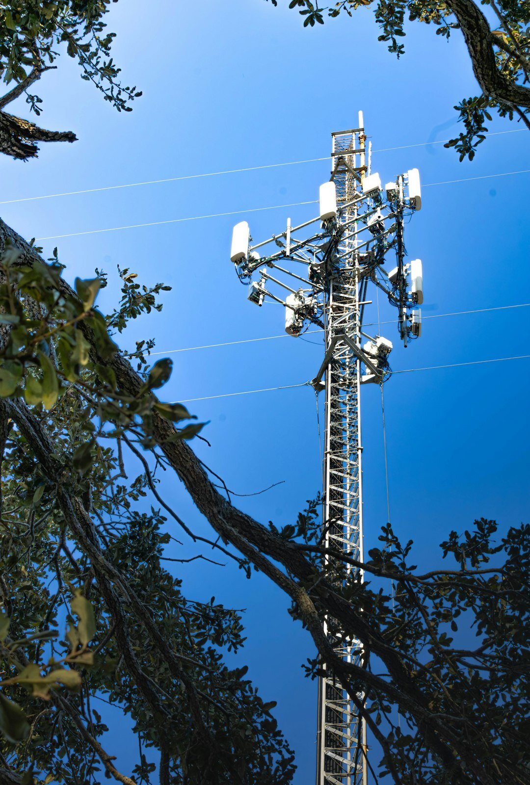Radio transmission tower against blue sky