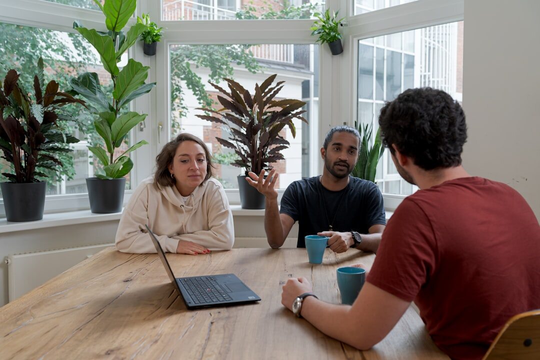 group discussing news in meeting
