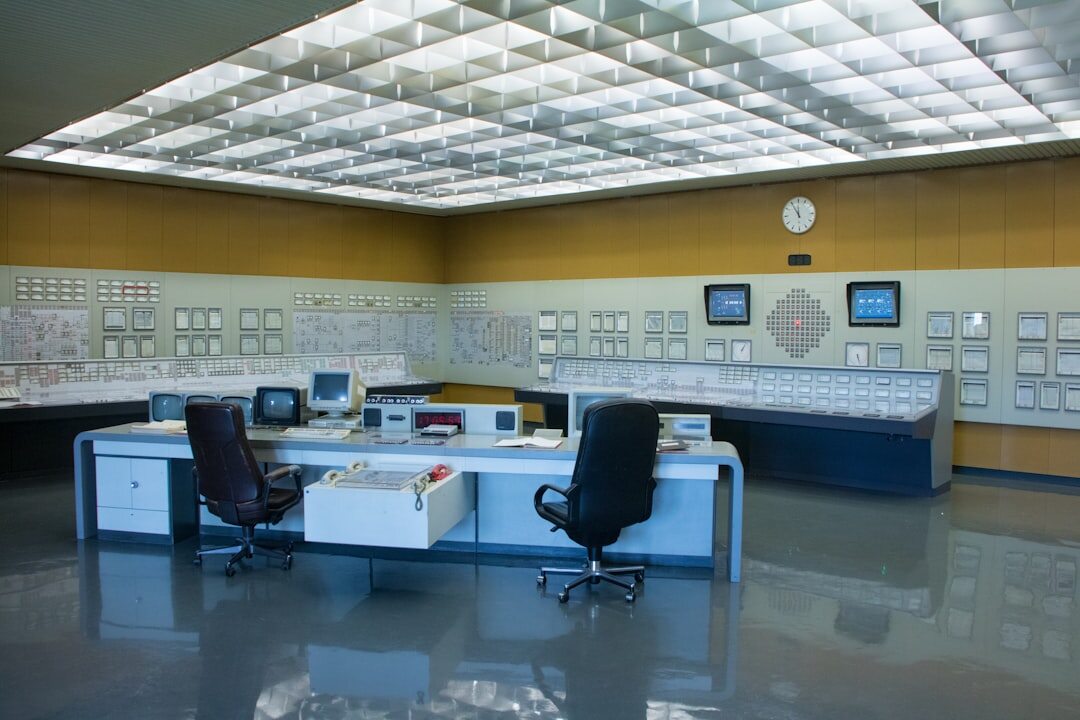 Modern newsroom with journalists working